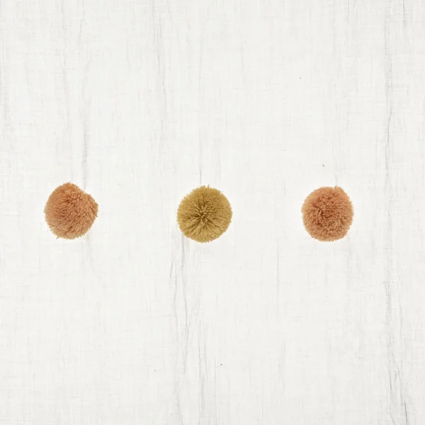 VOILAGE POMPONS ROSE OCRE